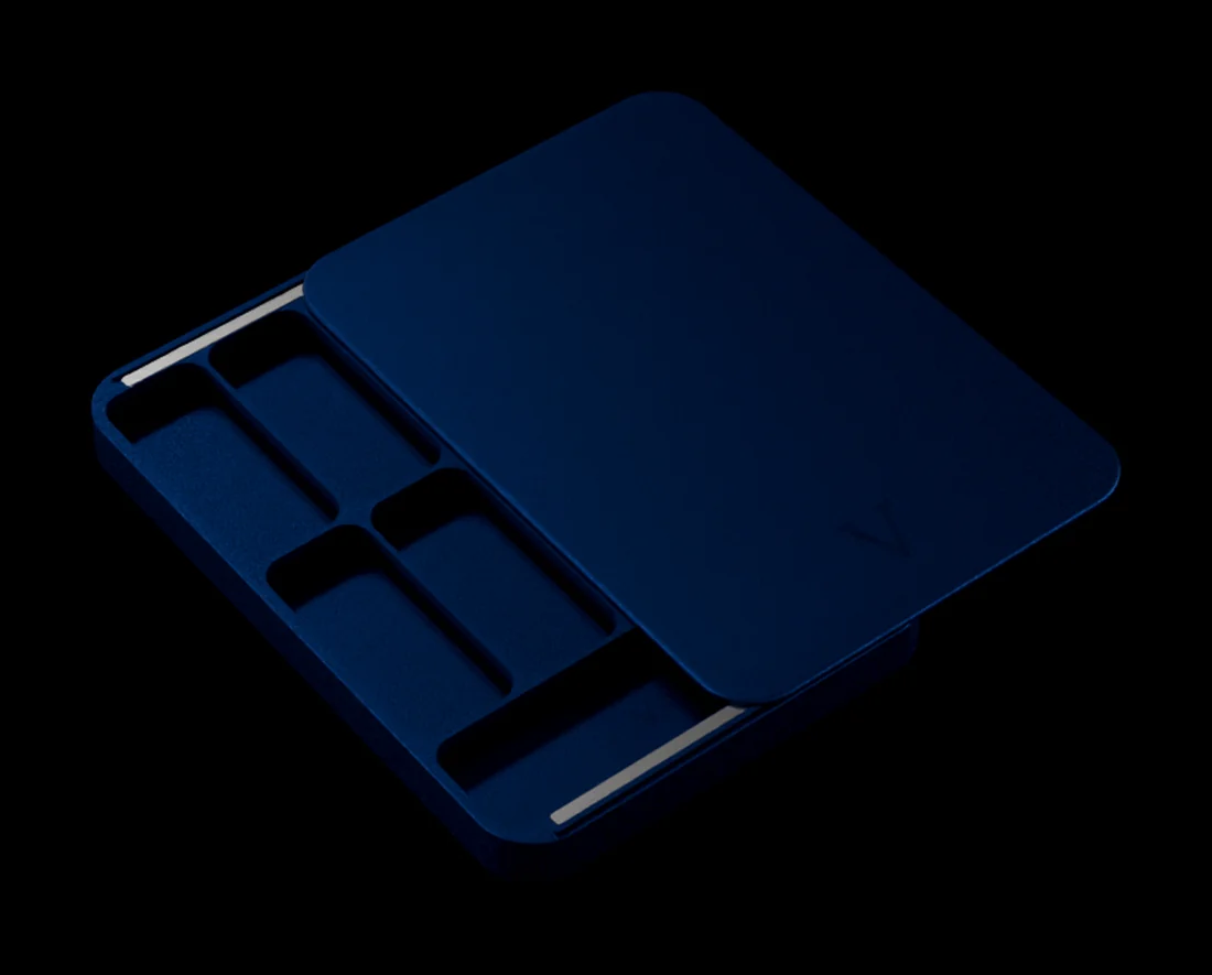 VALT aluminium nicotine pouch case, Midnight Blue anodised finish, lid open showing eight pouch slots