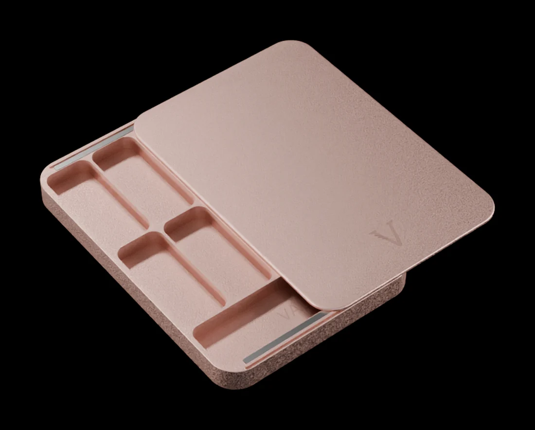 VALT aluminium nicotine pouch case, Rose Gold anodised finish, lid open showing eight pouch slots