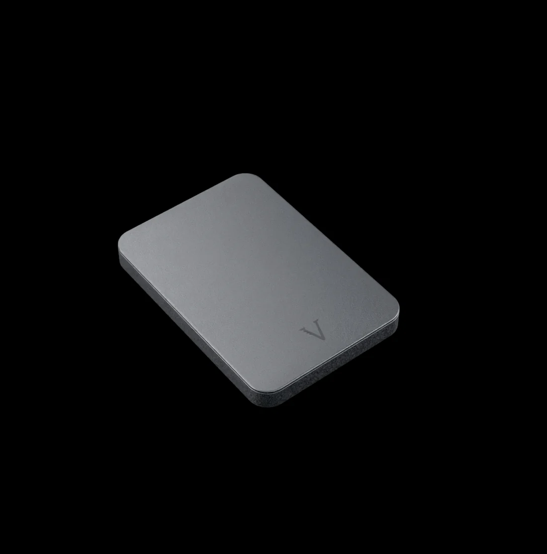 VALT aluminium nicotine pouch case, lid closed, 9.2 mm profile on the back of a phone